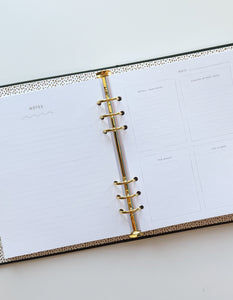 Image of pages of planner with "notes", and areas for writing various notes and dates. 