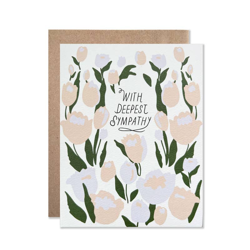 Greeting card with white background and images of pink and white tulips with green leaves. Green text says ,"With deepest sympathy". Kraft envelope included. 