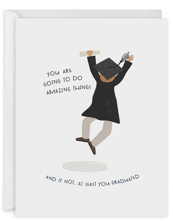 Greeting card with white background and image of a graduate wearing cap and gown holding a diploma with black text says, "You are going to do amazing things and if not, at least you graduated". White envelope is included. 