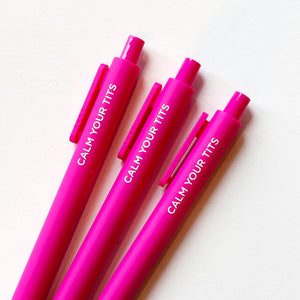 Image of three bright pink pens with white text says, "Calm you tits".