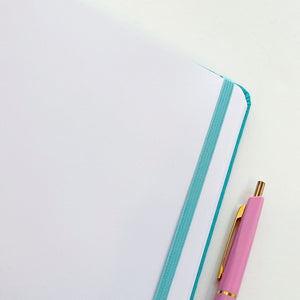 Close up of blank journal page in white. 