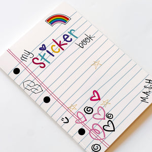 Image of sticker book with white background and blue lines like notebook paper with black and bright colored text says, "My sticker book" with doodles of red and pink hearts, rainbow. swirls and stars.