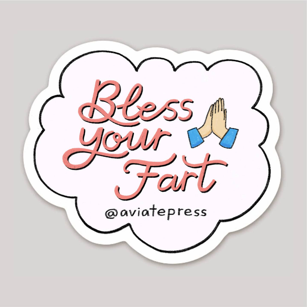 Decorative sticker with white background in the shape of a cloud with pink text says, "Bless your fart" with praying hands emoji and black outline. 