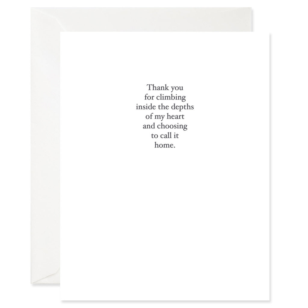 White card with black text saying, “Thank You For Climbing Inside the Depths Of My Heart And Choosing to Call It Home”. A light purple envelope is included.