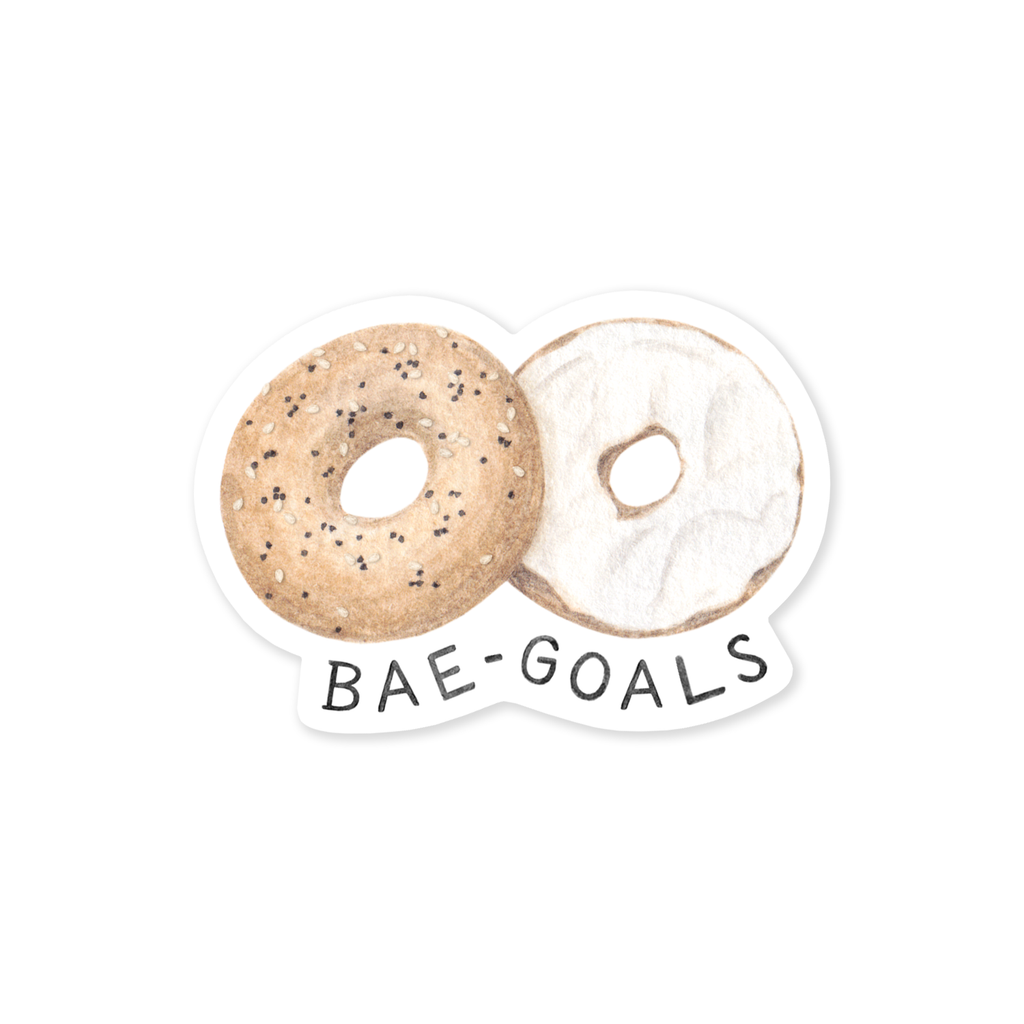 Image of an everything bagel sliced in half with left side showing top of bagel in tan with specks of black and ivory and right side open with cream cheese on it. Black text says, “BAE goals”.