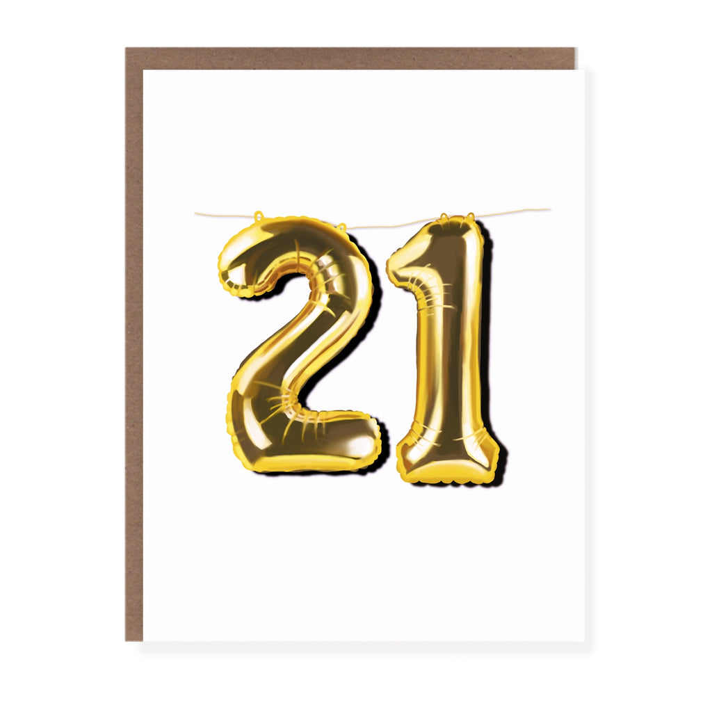 White card with images of large number 21 gold foil balloons. A brown envelope is included.