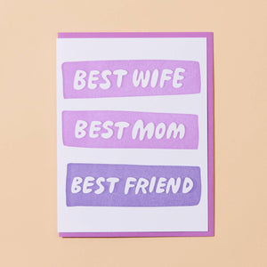 White card with three purple bubbles with white lettering in each saying “Best Wife” “Best Mom” “Best Friend”. Lavender envelope included. 