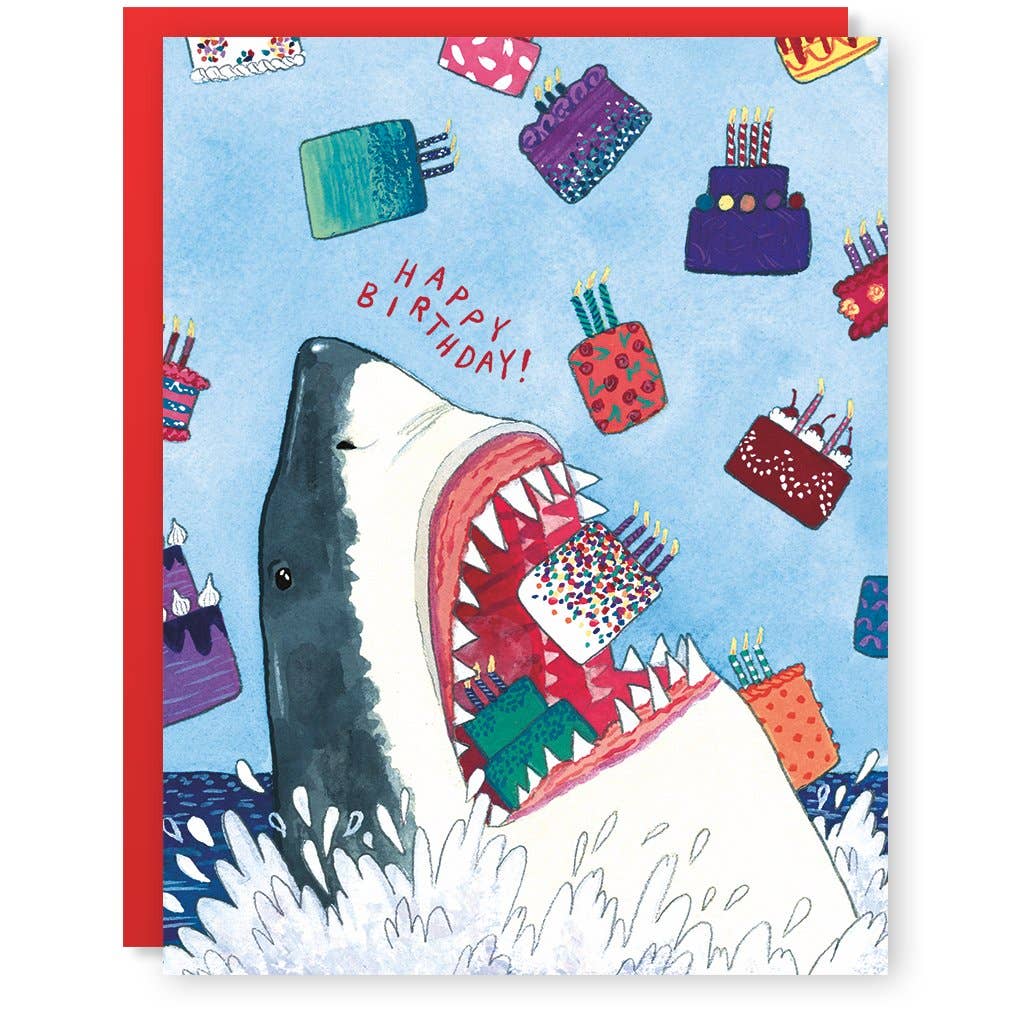 Blue card with red text saying, "Happy Birthday!" Image of birthday cakes underwater and a shark with mouth open eating birthday cakes. A red envelope is included.