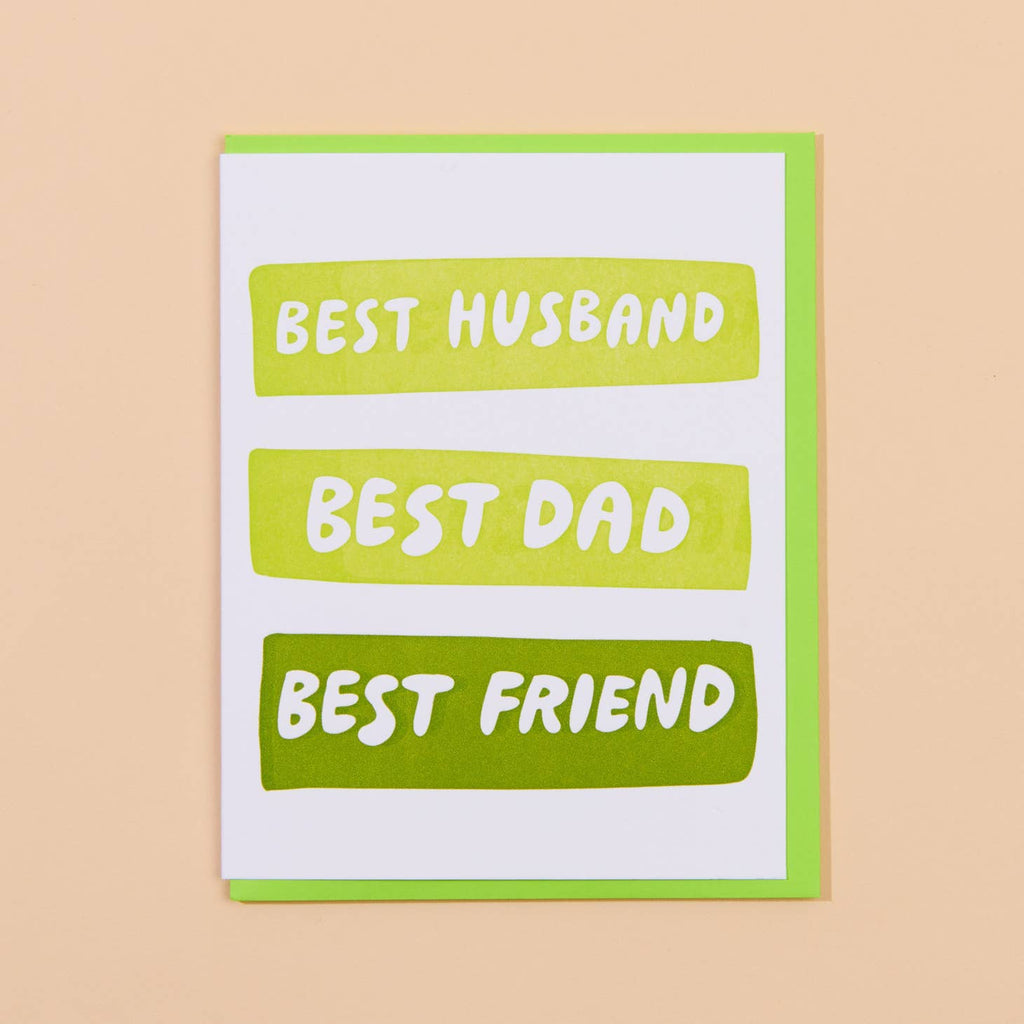 White card with three green bubbles with white lettering in each saying “Best Husband” “Best Dad” “Best Friend”. Bright green envelope included. 