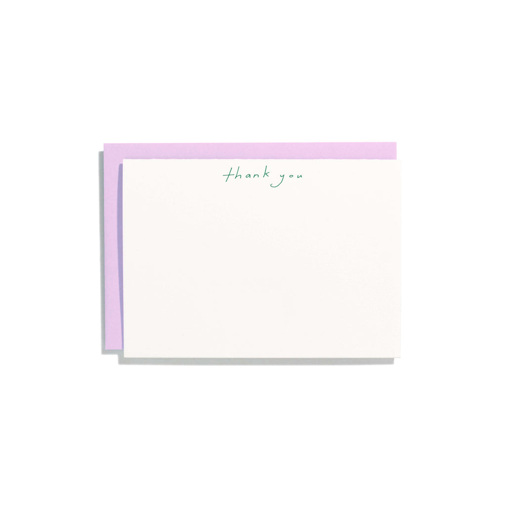 Ivory background with green text at top of card says, “Thank you”. Lavender envelopes included. 