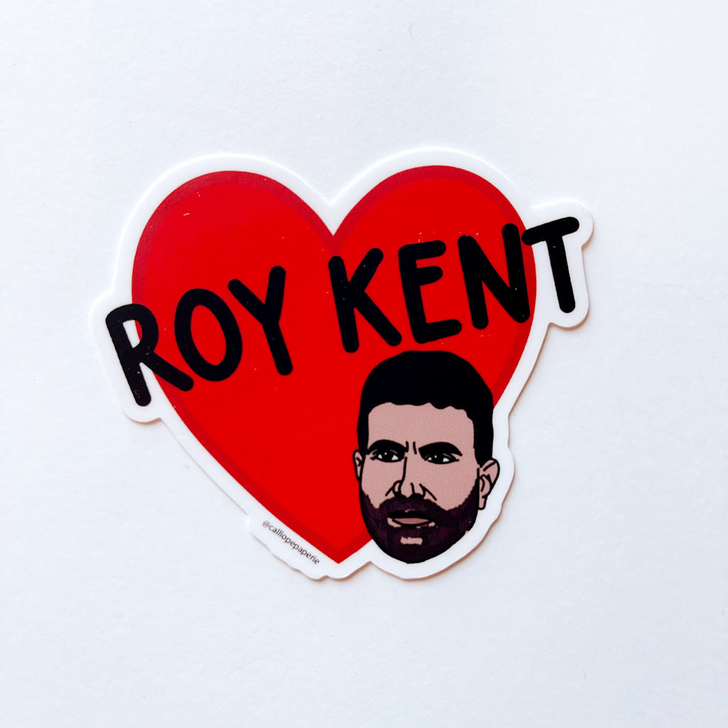Large red heart with black text across "Roy Kent" with Roy's face at the bottom right.