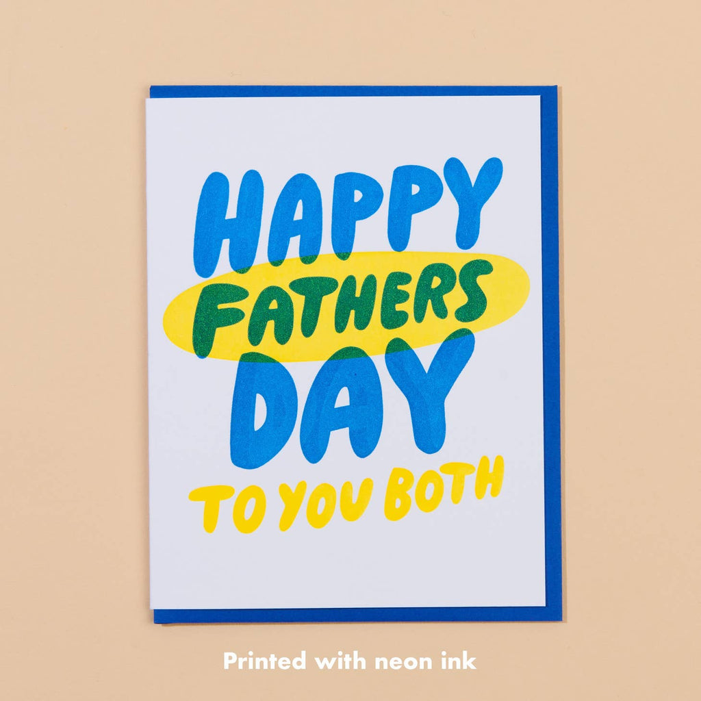 White card with blue and yellow text saying “Happy Fathers Day to your both”. Blue envelope is included.         