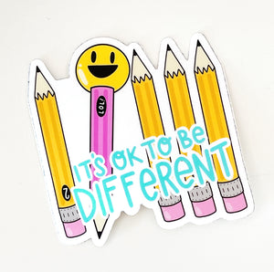 Image of sticker with four yellow pencils and one pink with smiley face top. Blue text says, "It's ok to be different".