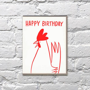 Greeting card with white background and red outline drawing of chicken with red text says, " Happy Birthday". Kraft envelope included.