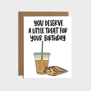 Greeting card with white background with image of iced coffee and a cookie with black text says, "You deserve a little treat for your birthday". Kraft envelope included. 