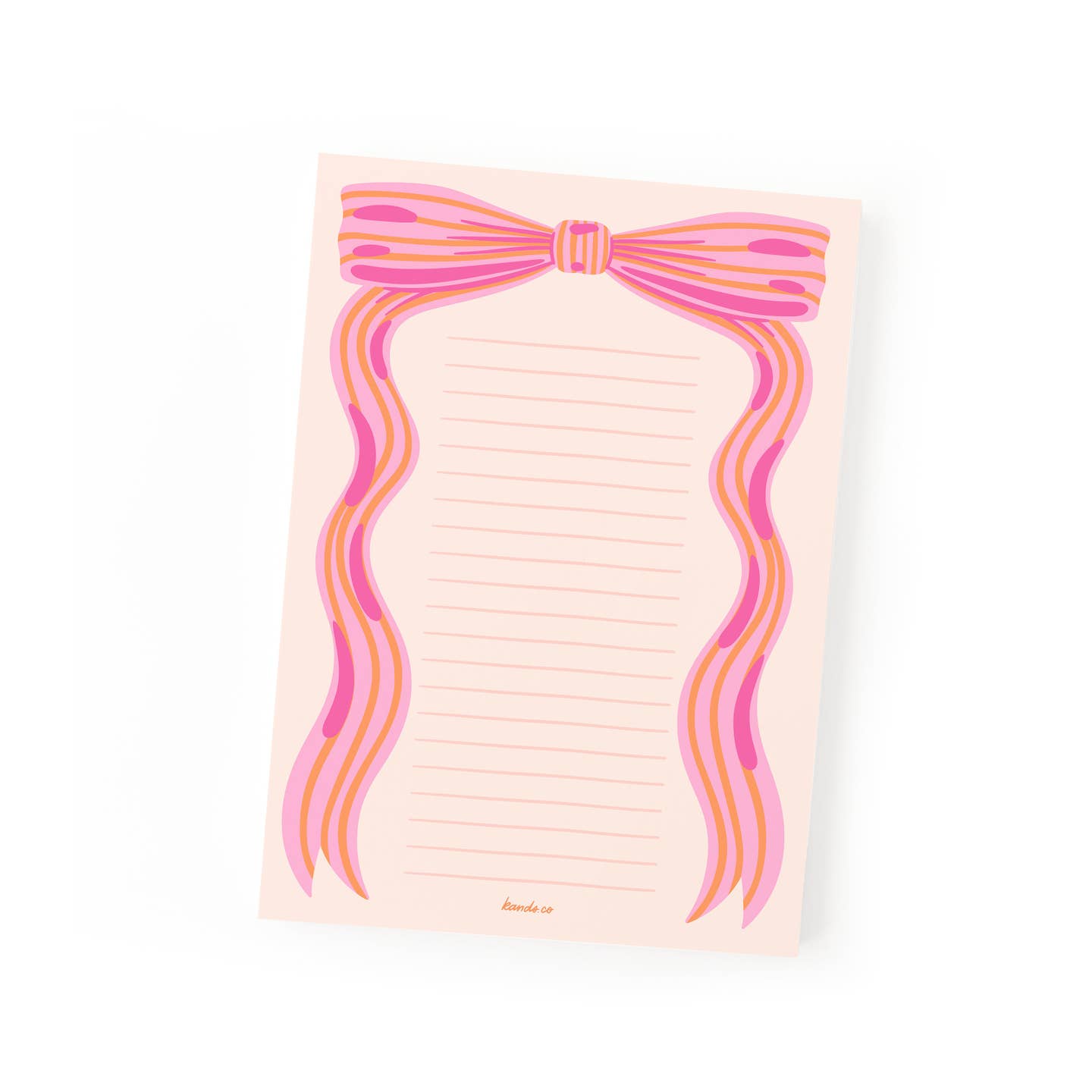 Notepad with pink background and a light pink, orange and bright pink bow at top with tails hanging on sides of pad as border. Pink lines for writing. 