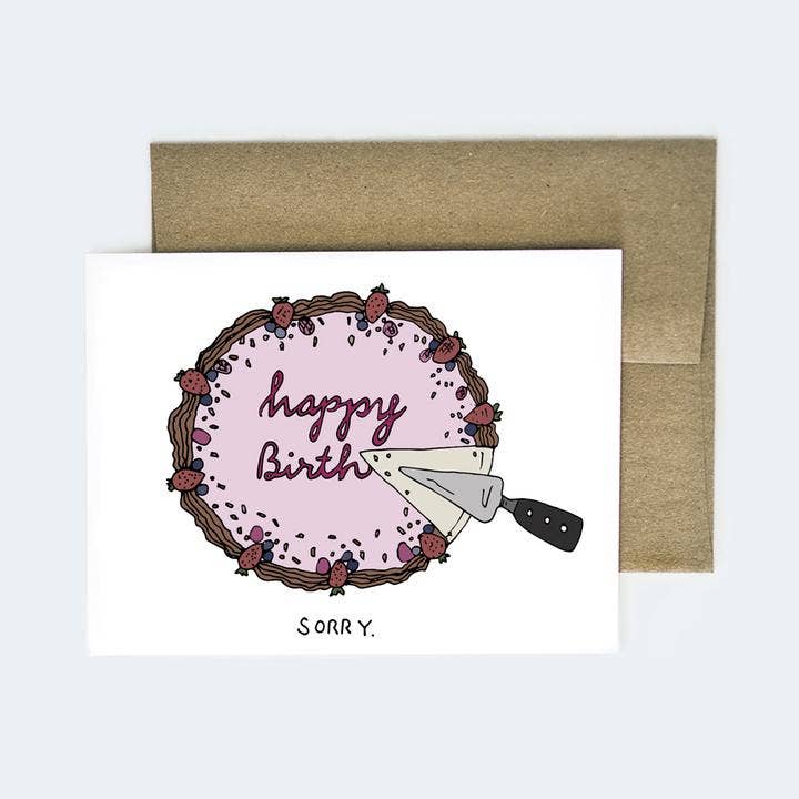 Greeting card with white background and image of lilac cake with red text says, "Happy Birth: with a slice taken out of it and a cake server. Black text says, "Sorry.". Kraft envelope included. 