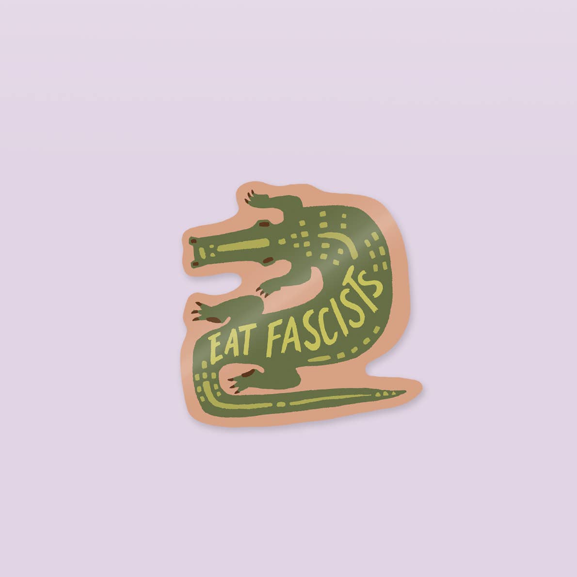 Decorative sticker in the image of a alligator with yellow text on its back says, "Eat Fascists". 