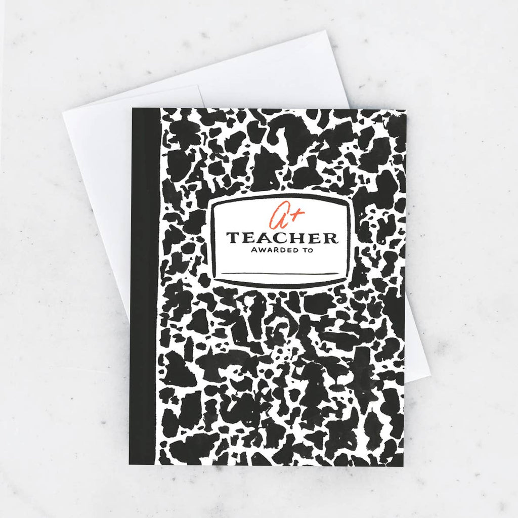 Greeting card with black and white background with white rectangle and binding. Red text says, "A+" and black text says, "Teacher awarded to" with line for name. White envelope included. 