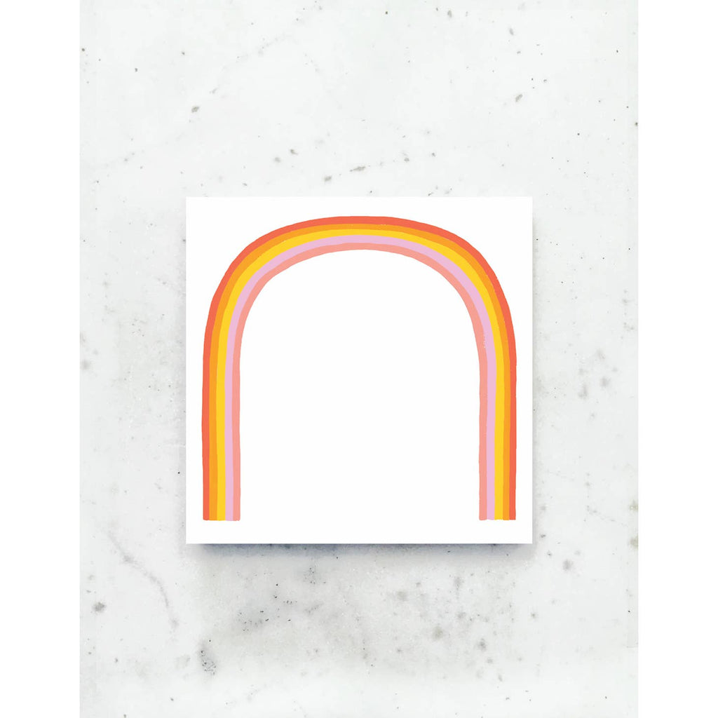 Image of notepad with white background with rainbow of red, orange, yellow, pink and dark pink. 