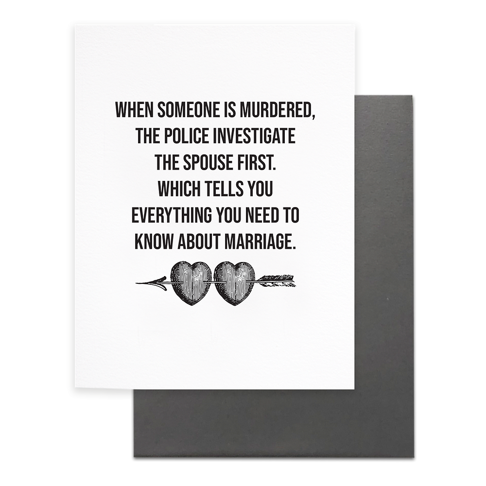 White background with grey text says, “When someone is murdered, the police investigate the spouse first. Which tells you everything you need to know about marriage.” Image of two hearts with an arrow through them. Grey envelope is included. 