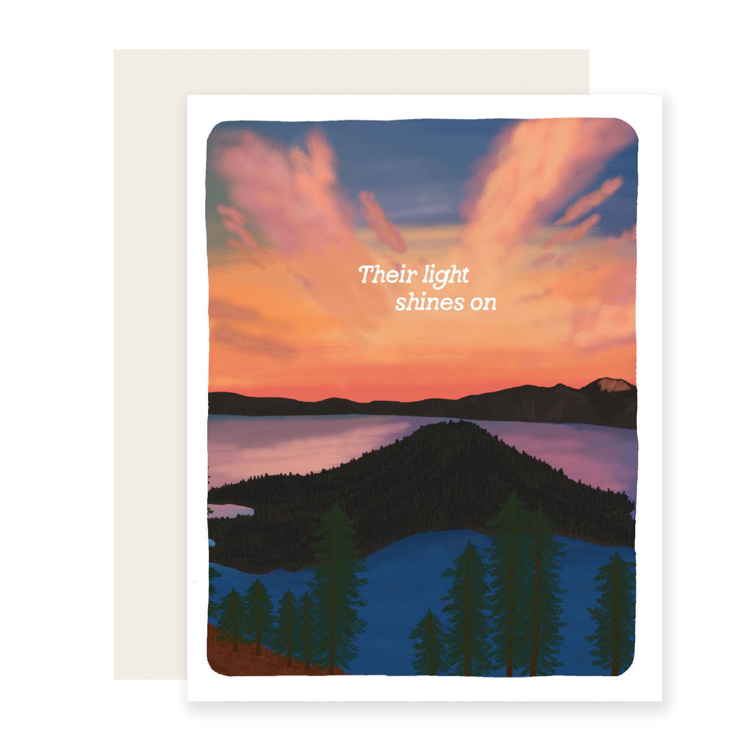 Greeting card with image of a sunset over water with mountains and trees and white text says, "Their light shines on". White envelope. included.