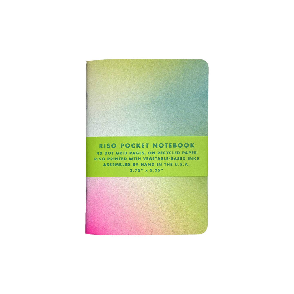 Notebook with neon hues in green, blue, yellow and pink.