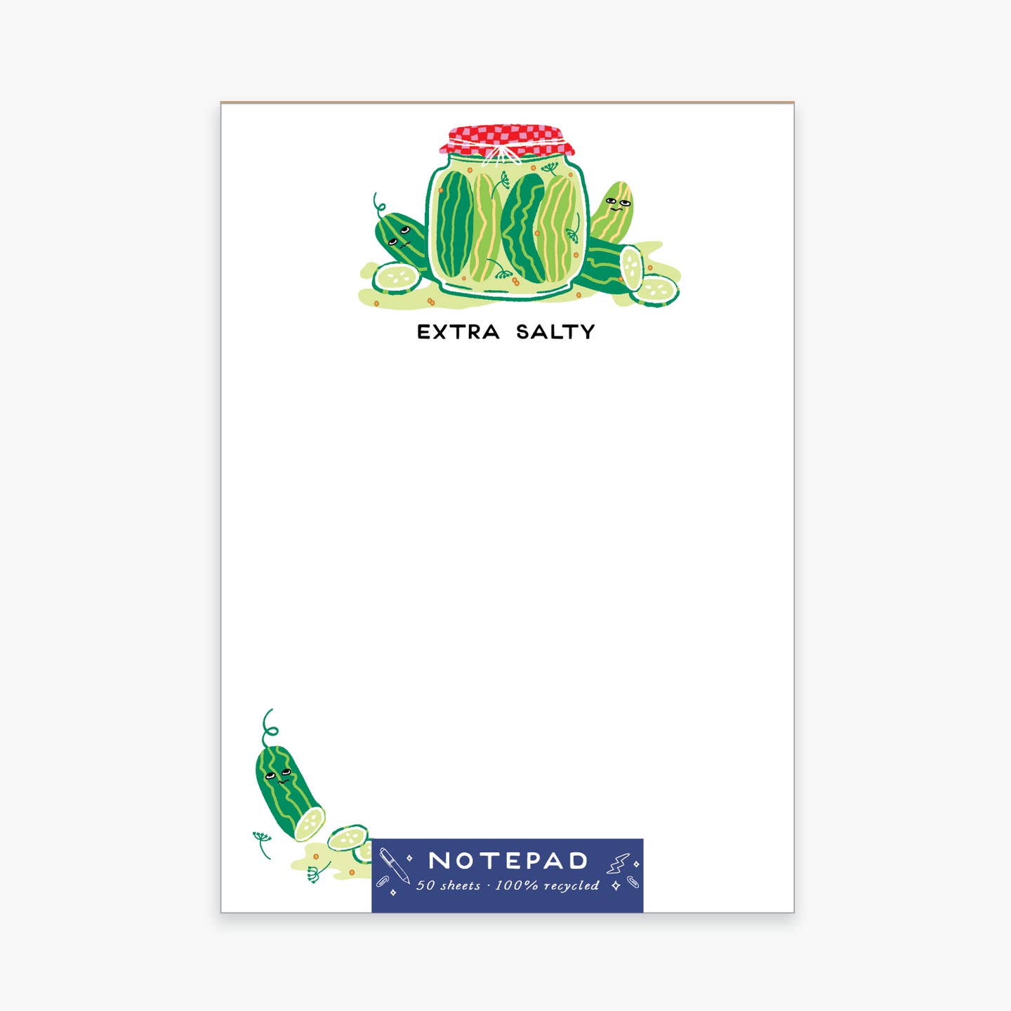 Notepad with white background with image of a jar of pickles at the top and black text says, "Extra salty". Image of pickle sliced at bottom left corner. 
