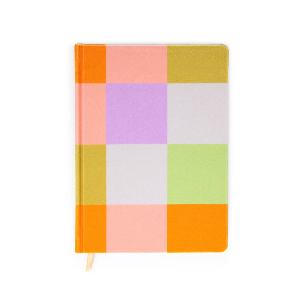 Journal cover in pastel check in orange, peach, chartreuse, lilac and green. 