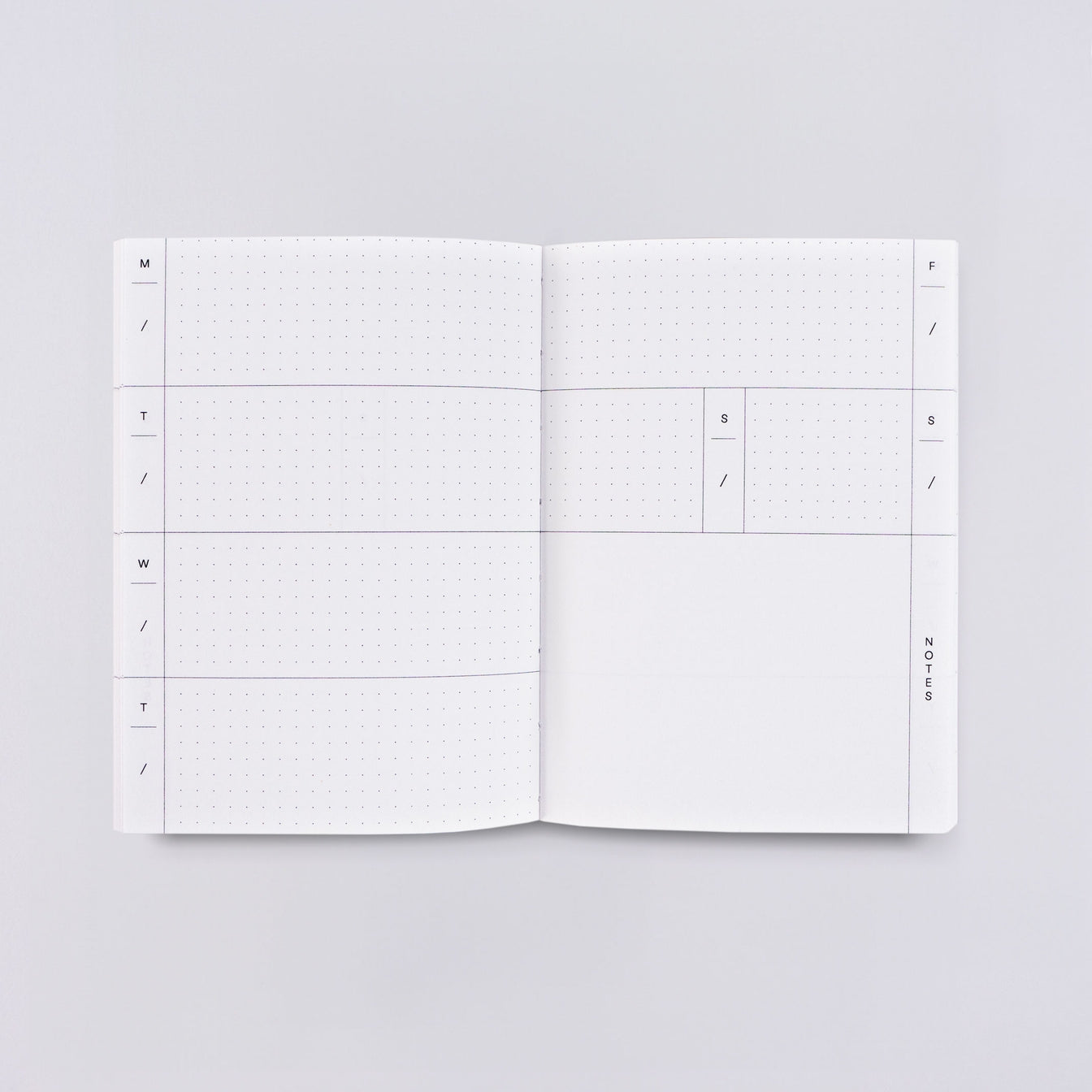 Planner page with white background and blocks with days of the week. 