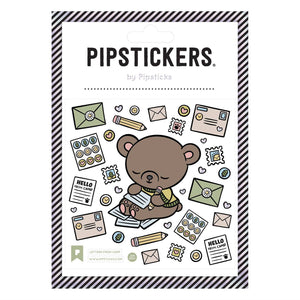 Sticker sheet with image of a brown bear writing a letter surrounded by images of letters, stamps and pencils. 