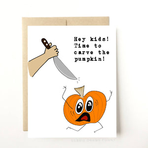 White background with image of orange pumpkin with stick arm and legs running away from a large knife with black text says, "Hey kids! Time to carve the pumpkin!". Kraft envelope included. 