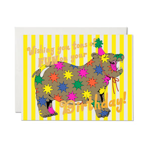 Greeting card with yellow and white striped background with image of brown hippo with rainbow colored star bursts and a pink party hat. Foil text says, "Wishing you tons of fun on your birthday!". White envelope included. 