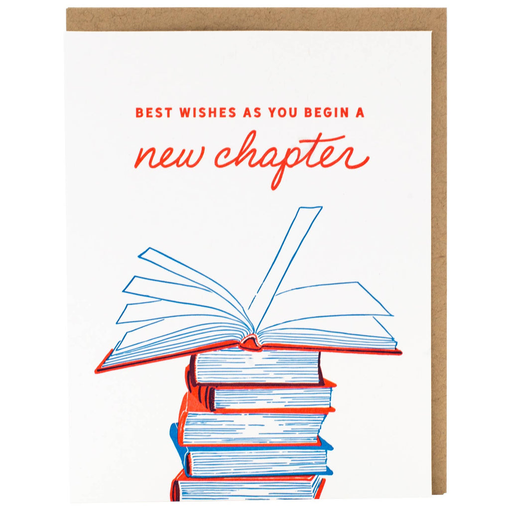 Greeting card with white background and image of a stack of books with red text says, "Best wishes as you begin new chapter". Kraft envelope included. 