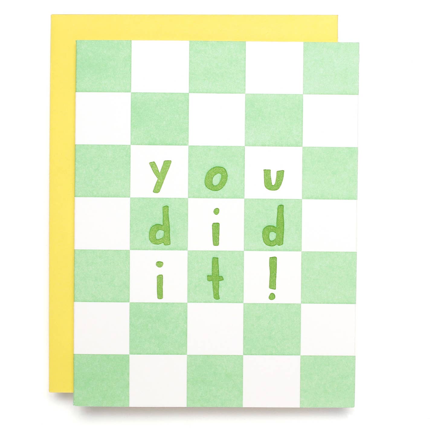 Greeting card with mint green and white checker background with green text says, "You did it!". Yellow envelope included. 