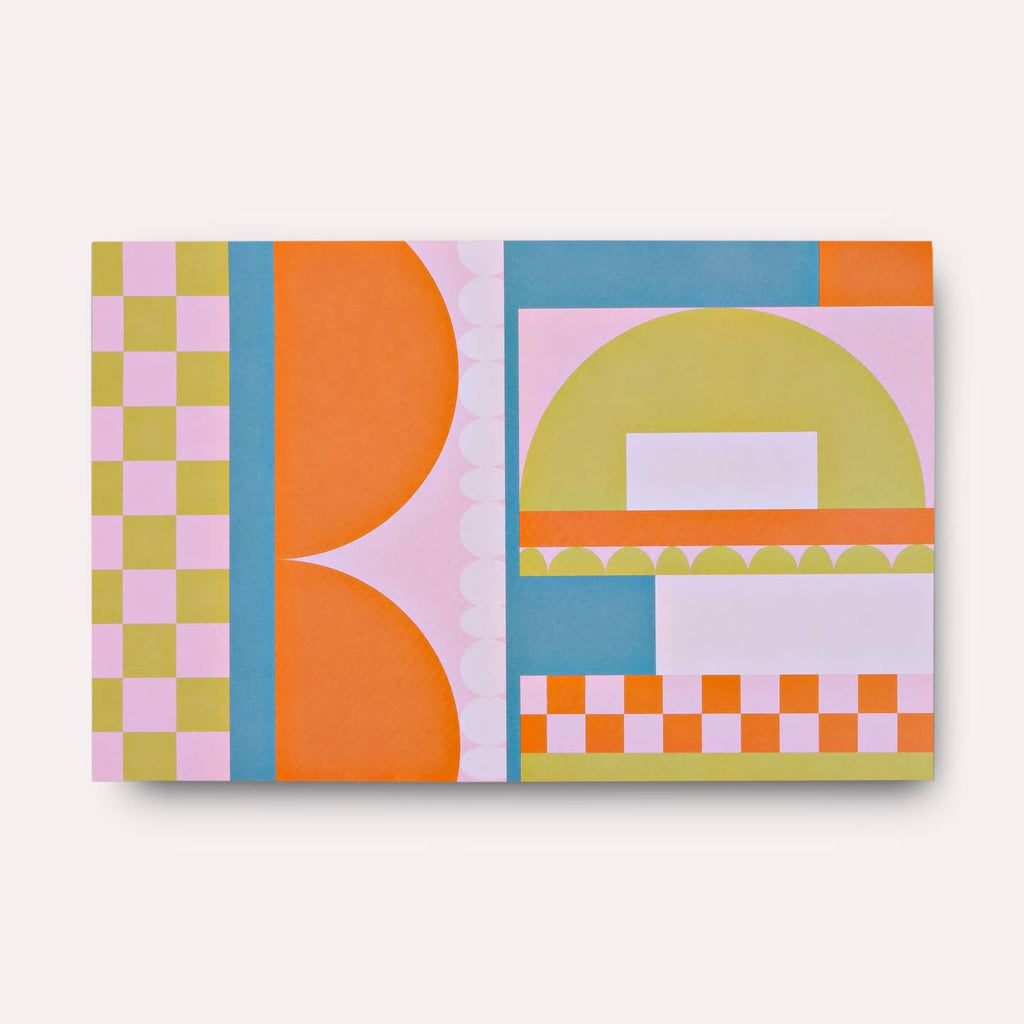 Planner cover with geometric designs in pink, chartreuse, orange, and teal. 