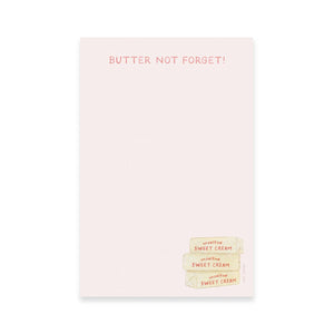 Image of notepad with pale pink background and image of three sticks 
of yellow butter in bottom right hand corner and dark pink text at top says, "Butter Not Forget!".