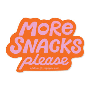 Decorative sticker with orange background and pink text says, "More snacks please".