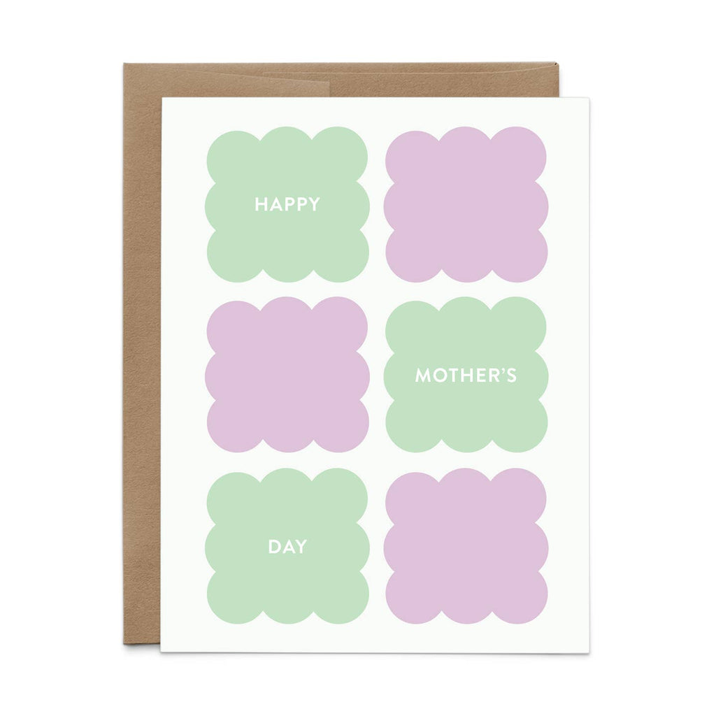 Greeting card with white background and scalloped boxes in mint and lilac with white text says, "Happy Mother's Day". Kraft envelope included.