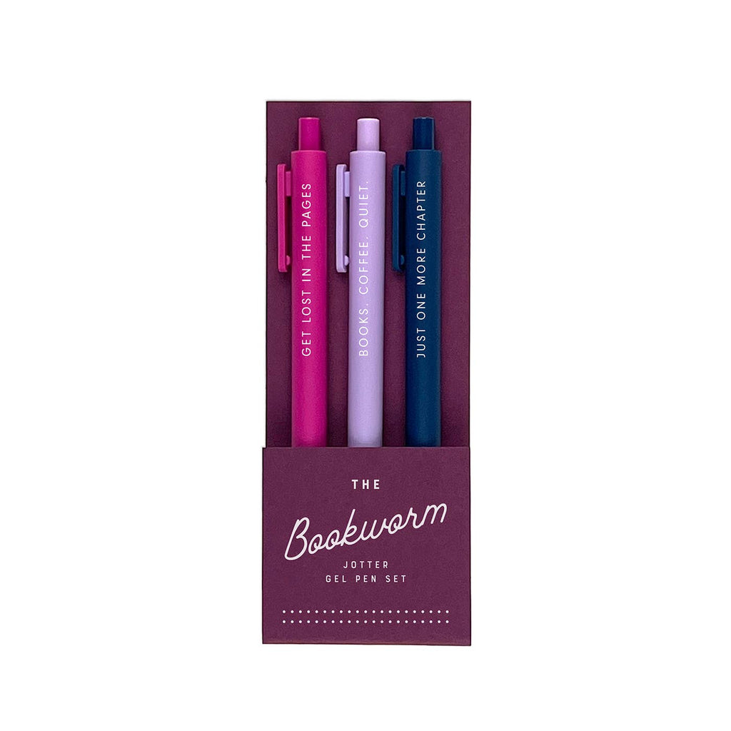 Pen set including pink, lilac and navy pens with white text says, "Get lost in the pages, Book, coffee, quiet, Just One more chapter". 