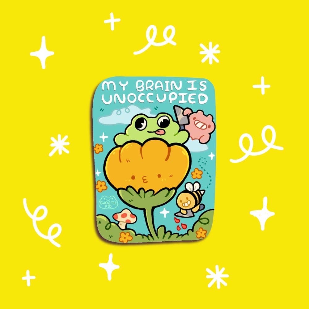 Image of sticker with aqua background and image of green frog on a yellow flower holding a knife. White text says, "My brain is unoccupied". 