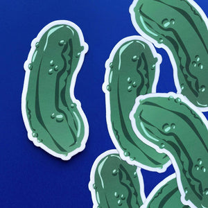 Image of a green pickle with white outline. 