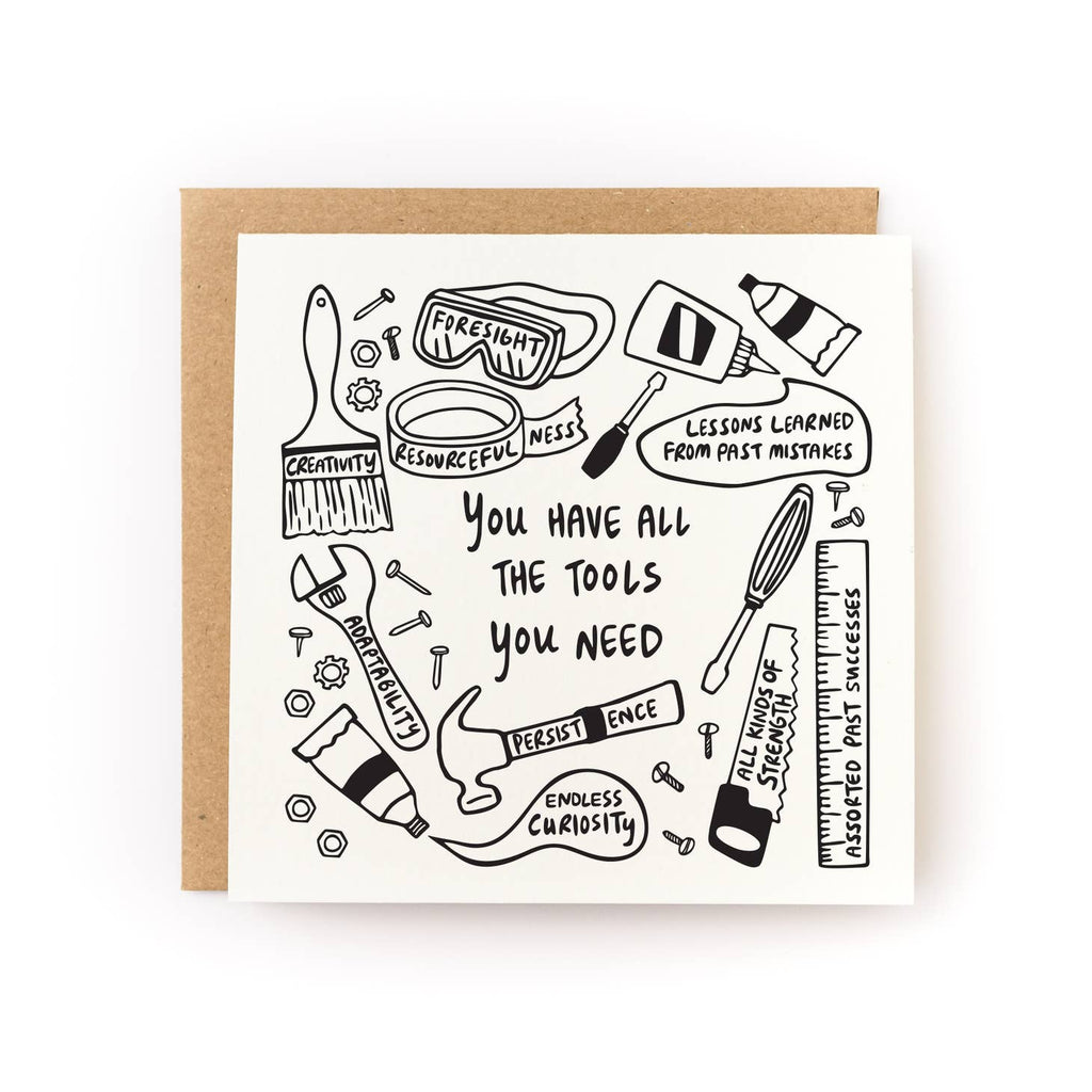 Greeting card with cream background with black outline images of tools like hammer, paintbrush, wrench, and tape. Black text says, "You have all the tools you need". Kraft envelope included. 