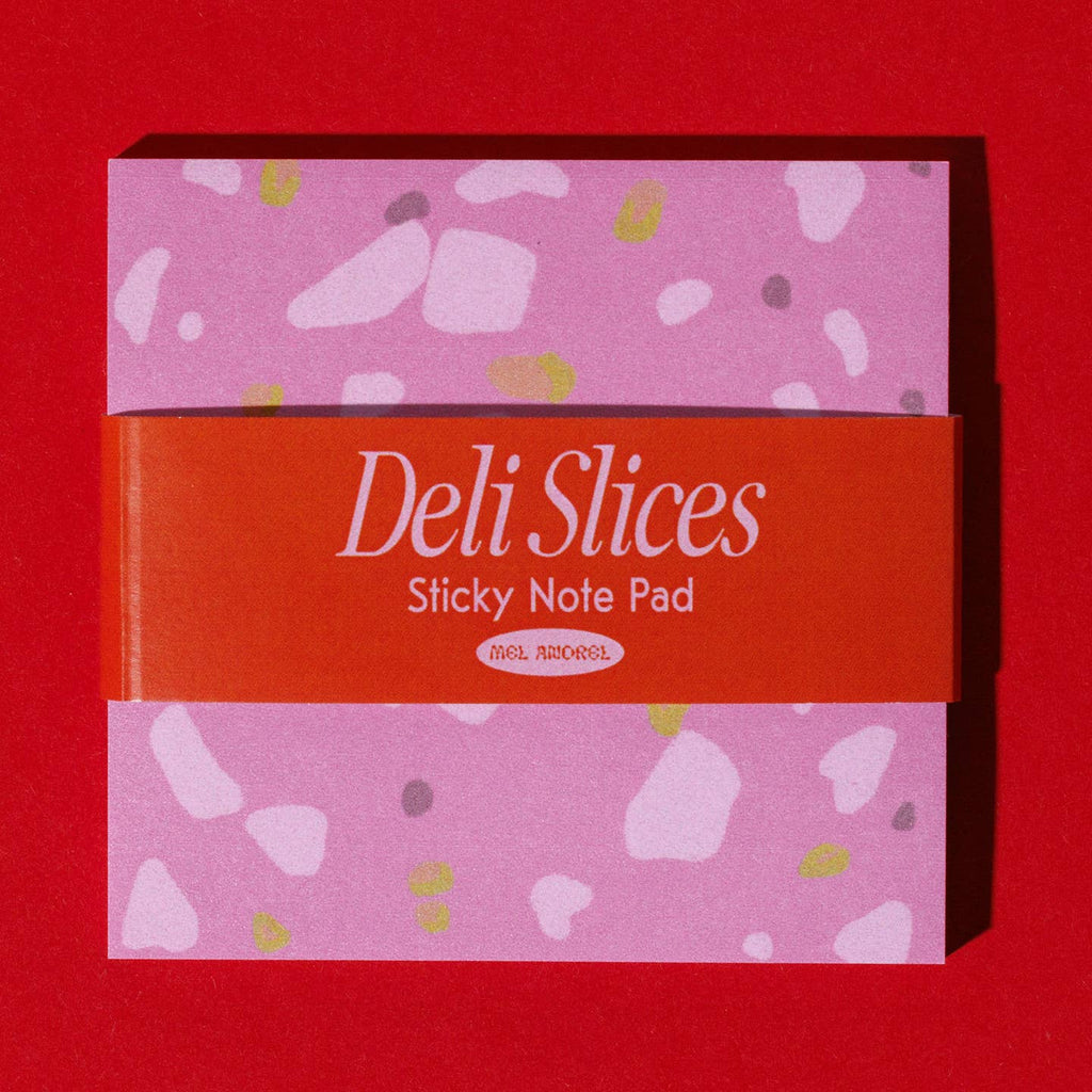 Sticky note pad with pink background and flecks of color in pink, yellow and burgundy to look like deli meat.