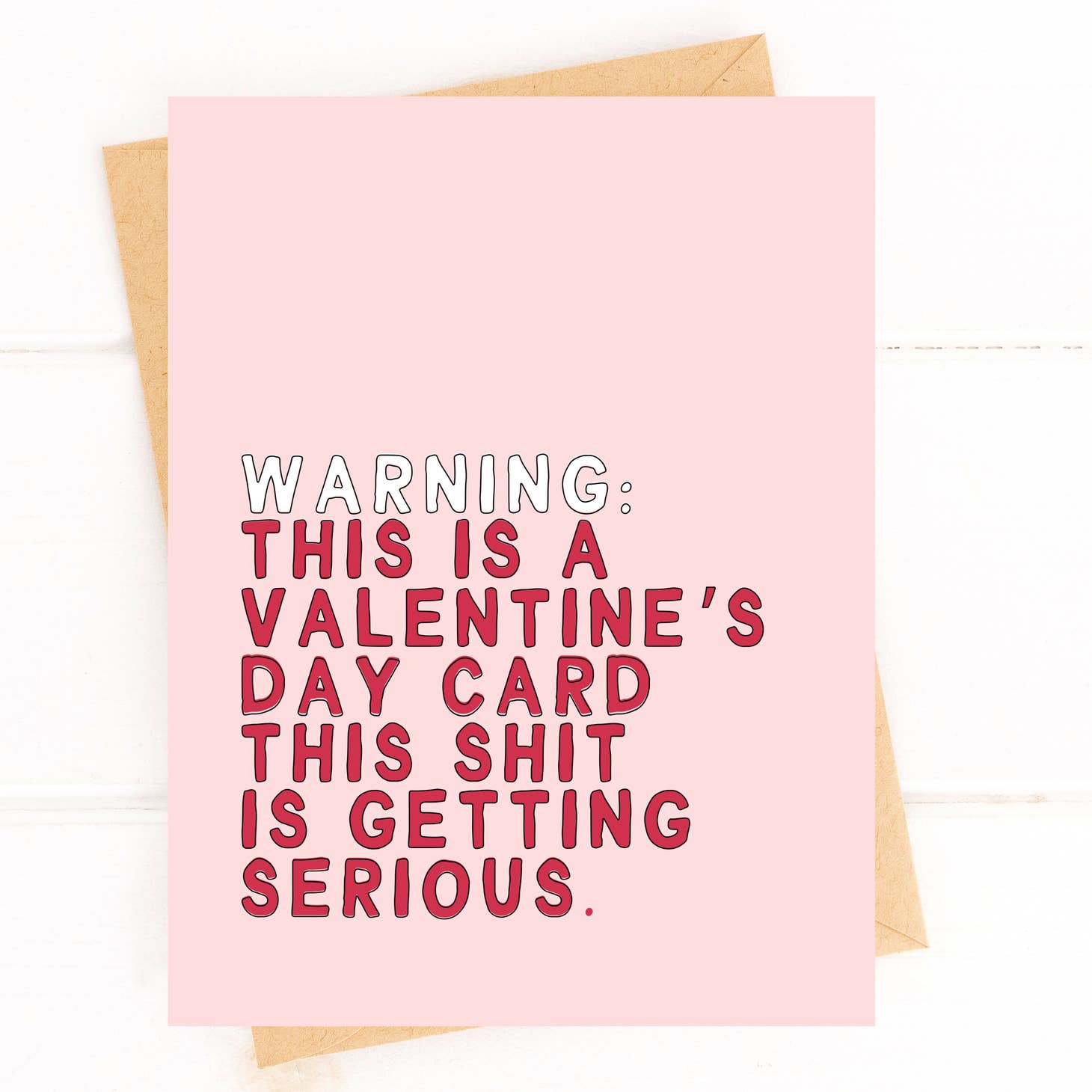 Pink card with white text "Warning" and red text "This is a valentine's day card this shit is getting serious"