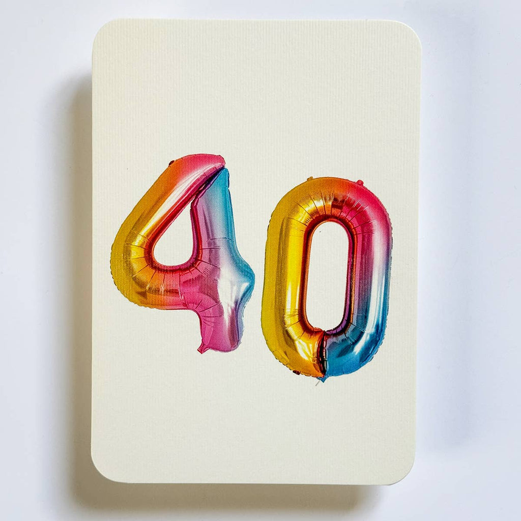 Greeting card with cream background and image of balloons text, "40". Envelope included.