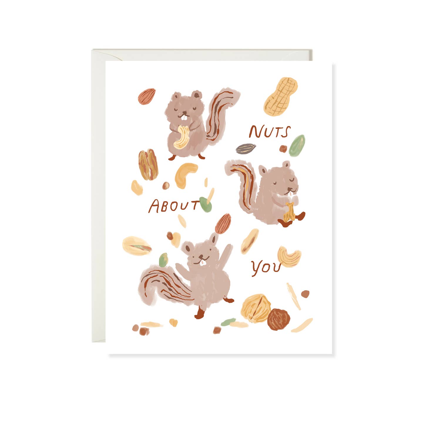 Greeting card with white background and images of brown squirrels with tan nuts and brown text says, "Nuts about you". Envelope included 