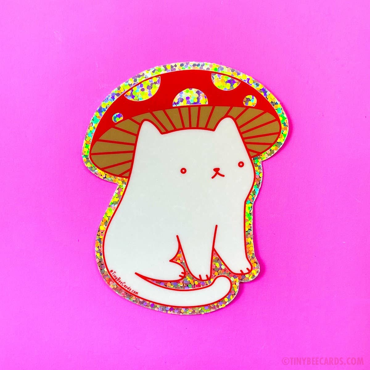 Image of white cat with red outline with red and brown mushroom cap as a hat and holographic background. 