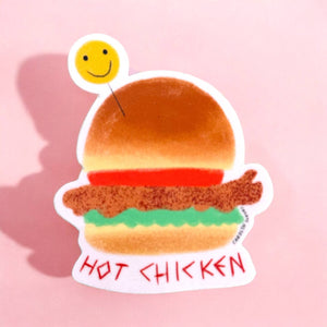 Decorative sticker in the image of hot chicken sandwich with red text says, "Hot chicken". 