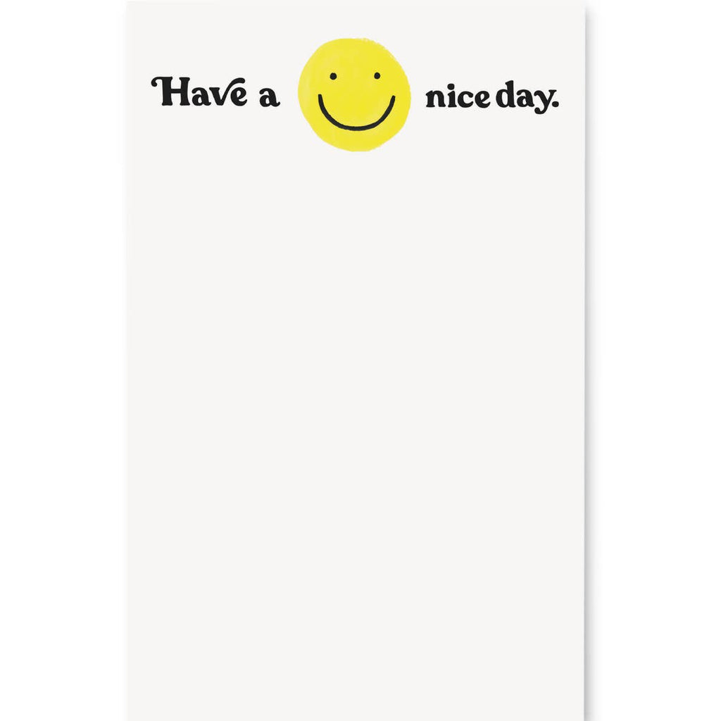 Notepad with white background and image of a yellow smiley face at top with black text says, "Have a nice day.". 